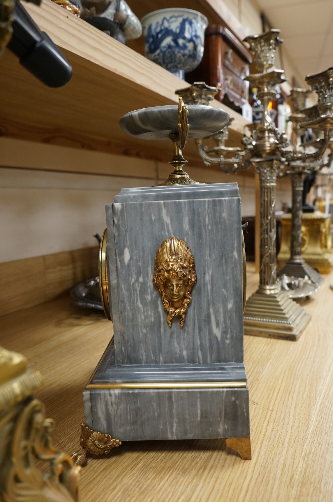 A French gilt metal mounted grey marble mantel clock, late 19th century, 35cm